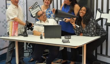 Docentes de la Escuela de Comunicación de UNIBE en el stand del 3er Congreso Nacional de Cine